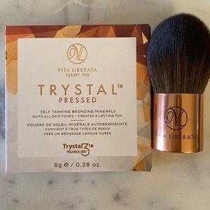 Vita Liberata Self Tanning Pressed Bronzer with kabuki brush.